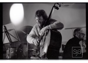 Man playing acoustic bass.