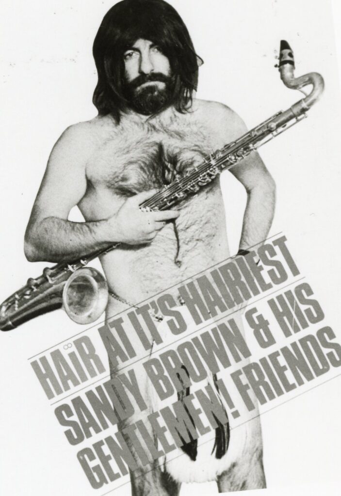 Partially clothed saxophonist.