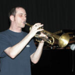 Man playing trumpet.