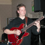 Man playing guitar.