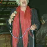 Woman singing.