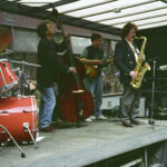 Jazz band on lorry trailer.