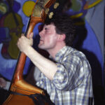 Man playing acoustic bass.