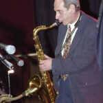 Man playing tenor saxophone.