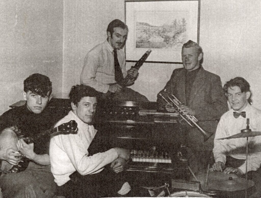 Five men playing jazz.
