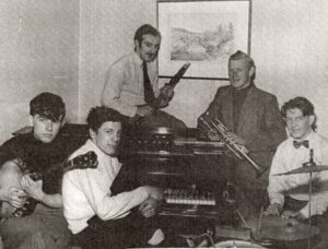 Five men playing jazz.