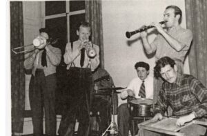 Six men playing jazz.