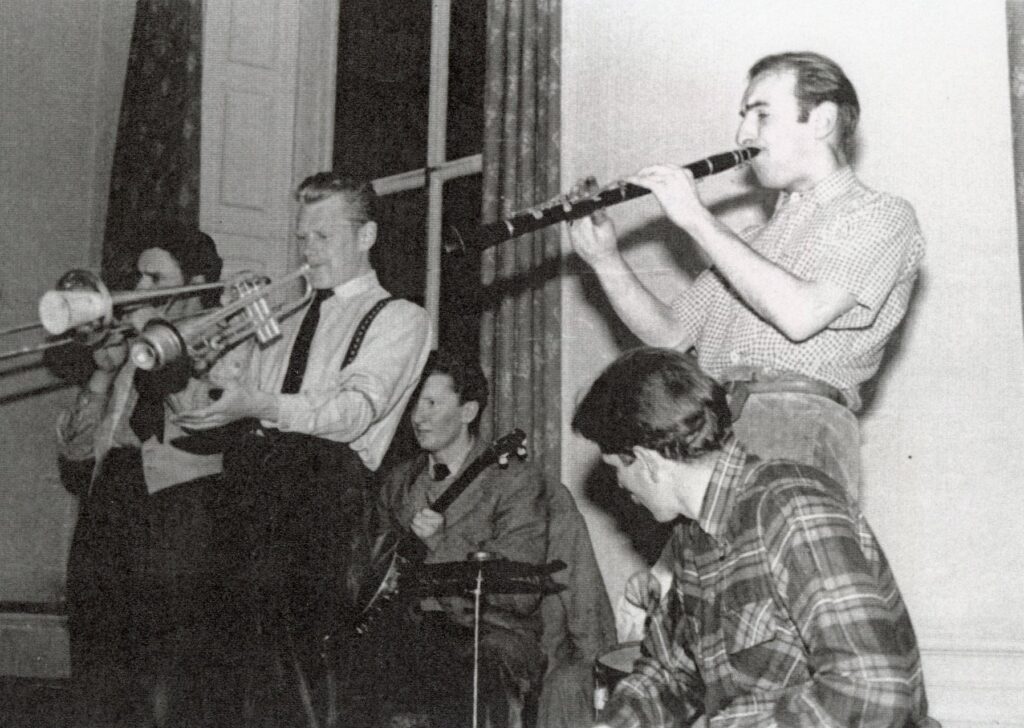 Five men playing jazz.