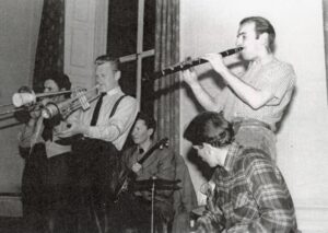 Five men playing jazz.