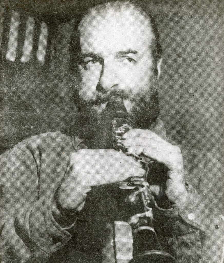 Man playing a clarinet.