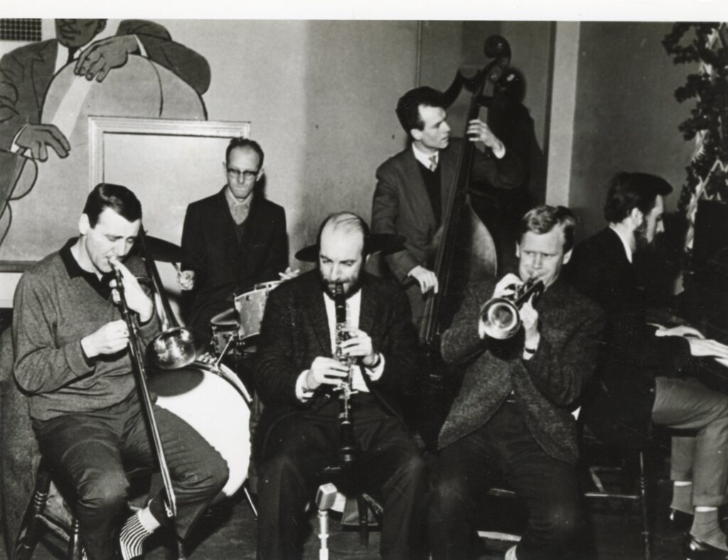 Six men playing jazz.