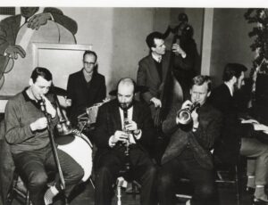 Six men playing jazz.