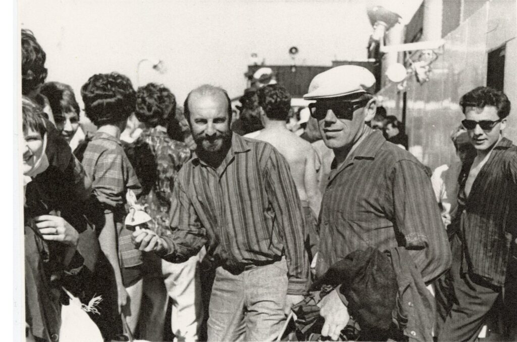 Three male musicians on tour.