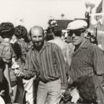 Three male musicians on tour.